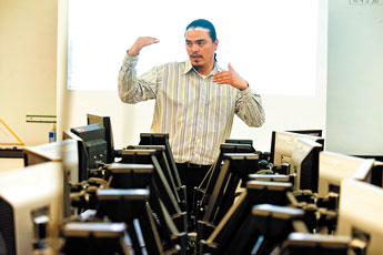Navajo Technical College instructor Gregory Dodge speaks to his computer aided design class on Thursday. The school is facing tough budget cuts, even as growth and demand for the school's programs has increased.  © 2011 Gallup Independent / Brian Leddy 